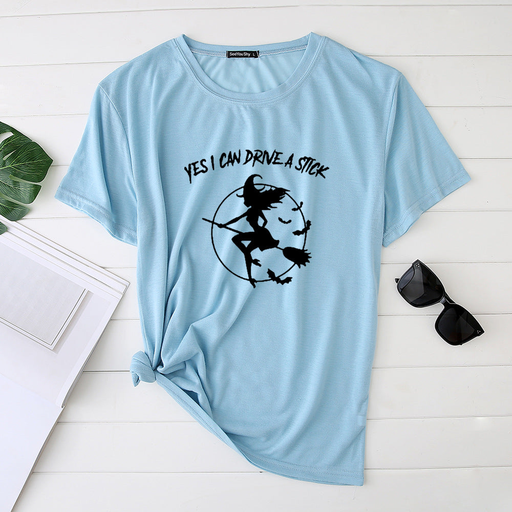 T-Shirt imprimé sorcière sur son balai "yes I can drive a stick"